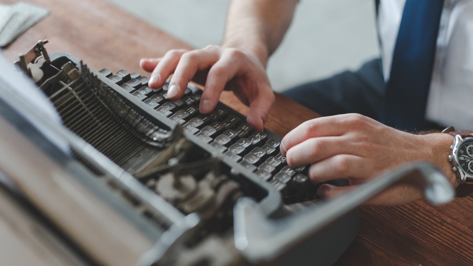 SEO content writer typing original blog posts and landing pages for Canadian businesses